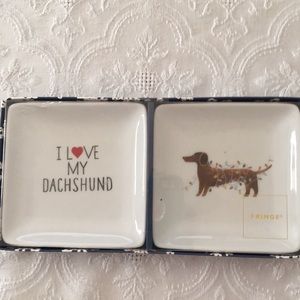 A set of Fringe Dachshund decoration trays